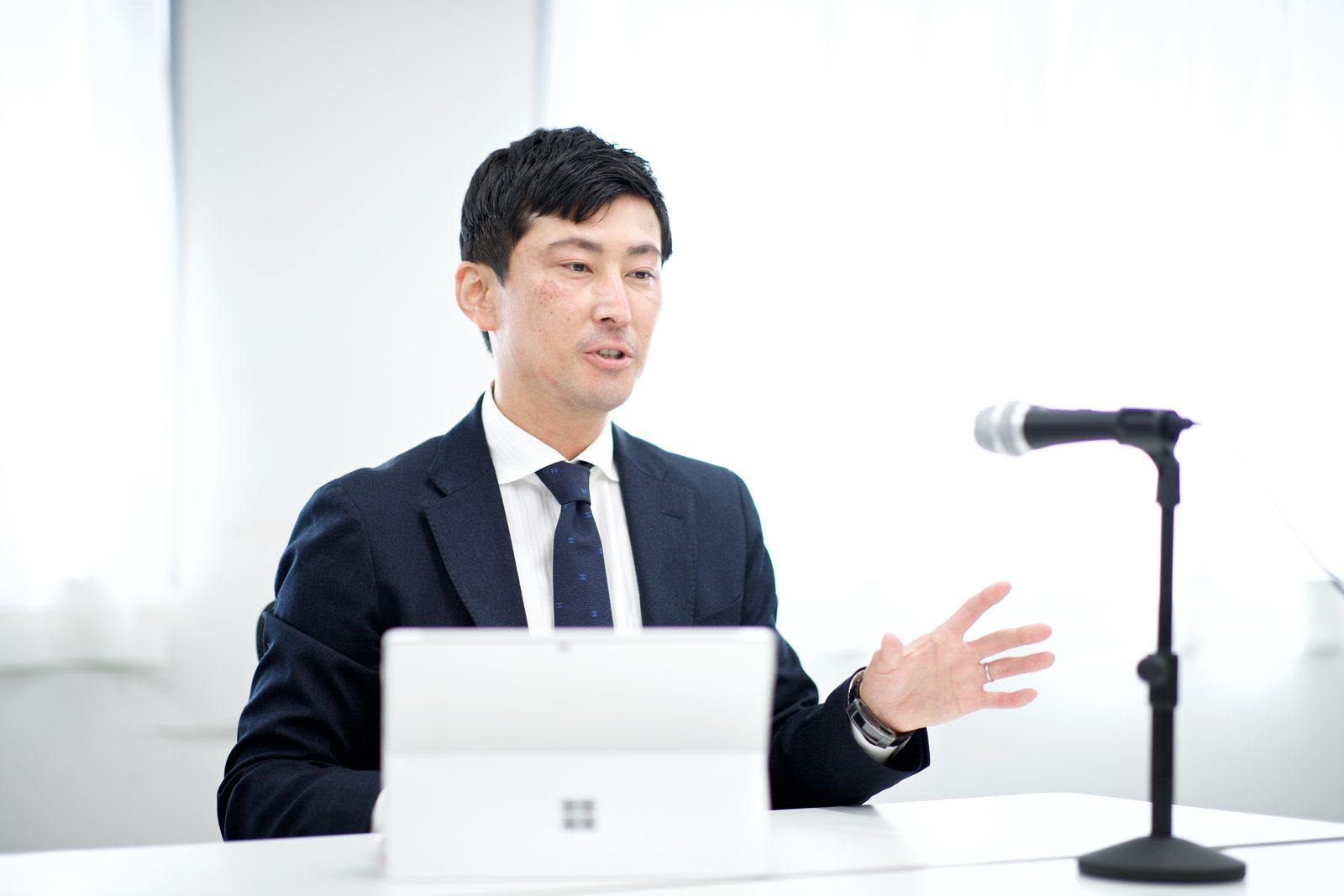 登壇して語る代表取締役社長 竹本伸吾